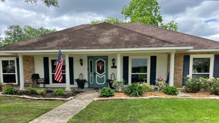 home with custom beige double hung windows