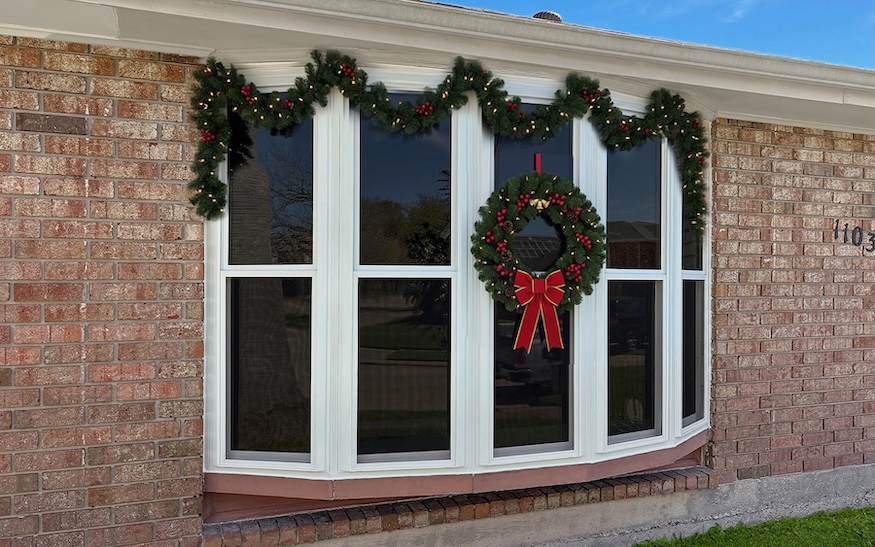 bow window with holiday decorations